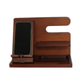 The Dark Wood Charging Shelf/Valet features slots for your smartphone, a small charging shelf, and a tray—ideal for keeping personal items organized on your desk or nightstand.
