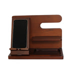 The Dark Wood Charging Shelf/Valet features slots for your smartphone, a small charging shelf, and a tray—ideal for keeping personal items organized on your desk or nightstand.