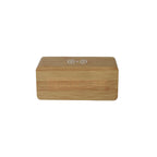 The Bamboo Wireless Phone Charger/Digital Clock, featuring a wireless charging symbol on top, is elegantly displayed against a plain white background.