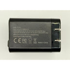 The 65W GaN USB-C Wall Charger with Built-In Cable & Foldable Plug is black, features fast USB-C and USB ports, labeled technical specs and safety certifications, and displays "Made in China" in white text.