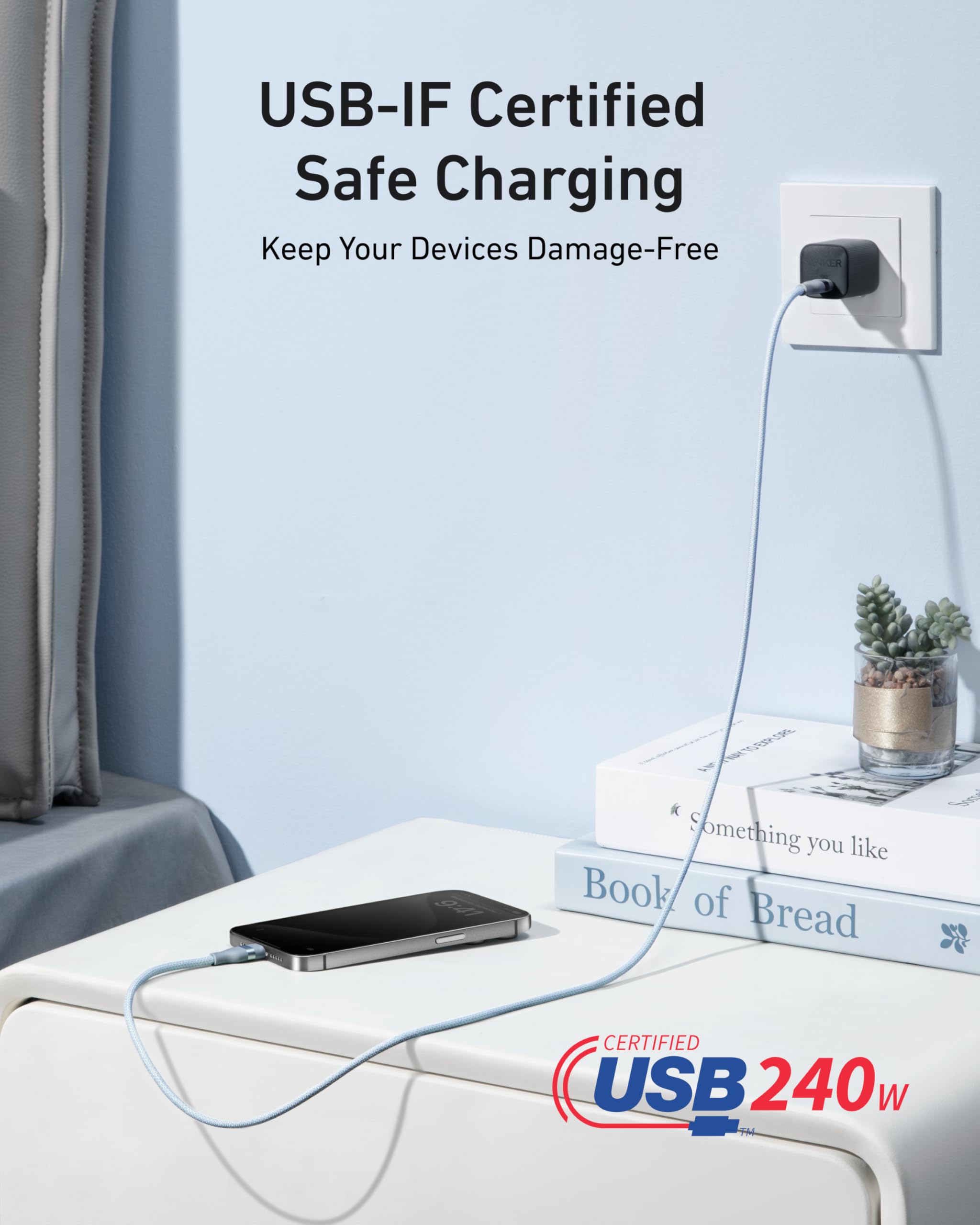 An Anker USB-C to USB-C Cable (3 ft / 6 ft, 240W, Upcycled-Braided) charges a smartphone on a bedside table. Text reads, "USB-IF Certified Safe Charging—Keep Your Devices Damage-Free" and highlights "Certified USB 240W.