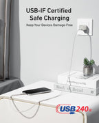 An Anker USB-C to USB-C Cable (3 ft / 6 ft, 240W, Upcycled-Braided) charges a smartphone on a white nightstand with nearby books and a small plant. Text: "USB-IF Certified Safe Charging. Keep Your Devices Damage-Free. USB 240W Certified.