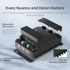 The image displays the Renogy 12V 30A DC to DC Battery Charger with MPPT, a sleek black electronic device featuring removable side covers, an integrated terminal design, and a die-cast aluminum bottom. Shown with one cover partially removed to reveal its connector ports, this unit serves as a smart dual input solar and alternator charger—ideal for managing auxiliary battery charging in various applications, including lithium, AGM, gel, and flooded batteries.