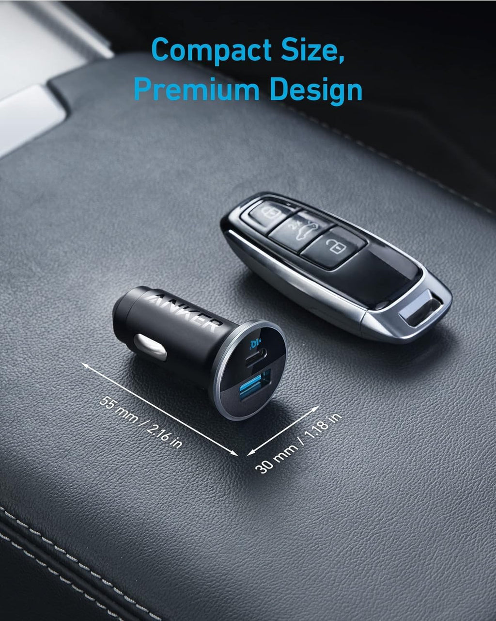 A black Anker 323 Car Charger (52.5 W) and a car key fob rest on a car’s leather console. Text above reads “Compact Size, Premium Design.” The charger measures just 55 mm x 30 mm (2.16 in x 1.18 in).