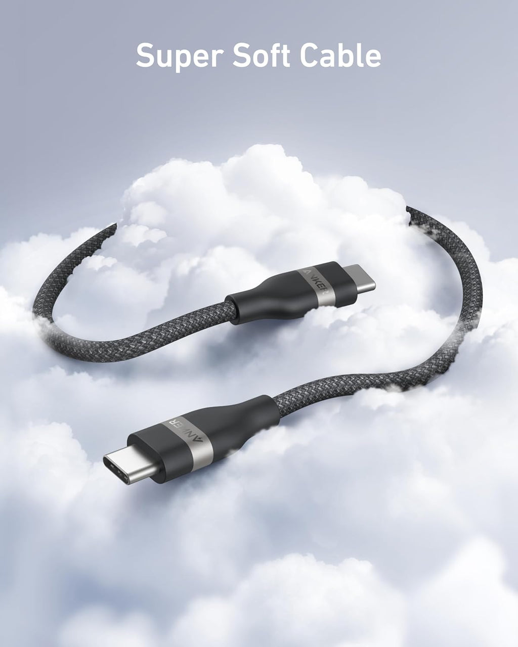 A black Anker USB-C to USB-C Cable (3 ft/6 ft, 240W, Upcycled-Braided) floats on clouds with "Super Soft Cable" above, emphasizing its softness, flexibility, and ultra-durable upcycled braided design.