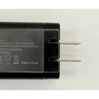 A close-up of the 65W GaN USB-C Wall Charger with Built-In Cable & Foldable Plug, featuring two metal prongs and technical specs on its surface, highlights its fast charging capability and "Made in China" text.