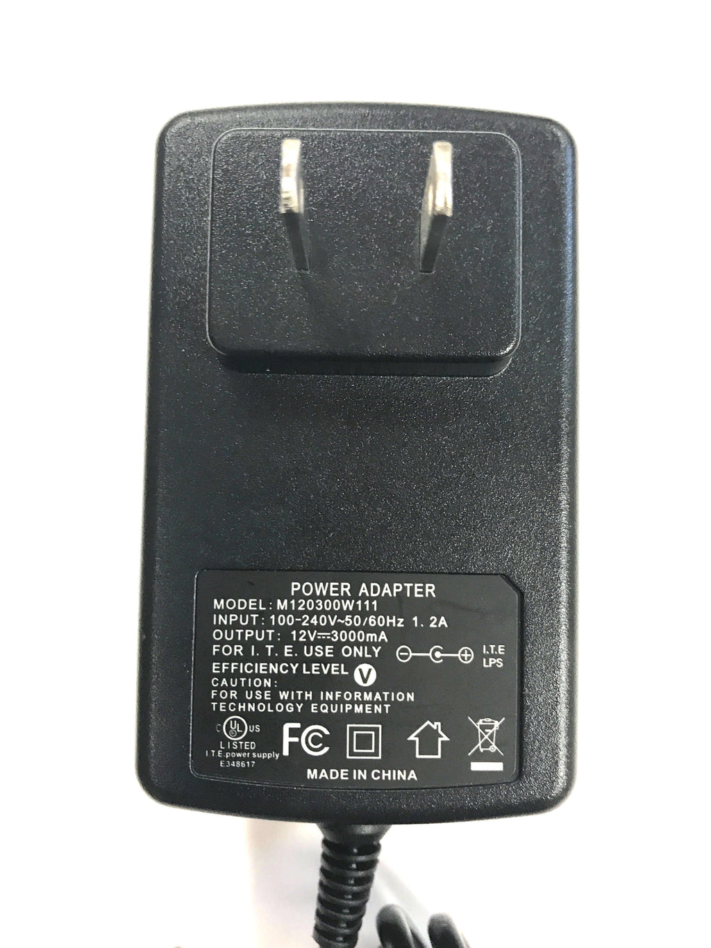 The Naxa AC Adapter Power Supply Charger (12V, 3A, 36W, 2.1mm x 5.5mm) for LED LCD TVs up to 15" is black with two metal prongs and a label showing specs, efficiency, safety certifications, and "Made in China.