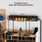 A CRST 8-Outlet Wide Metal Surge Protector Power Strip (16.3 x 2.55 x 1.77 in), with individual switches and a 6ft cord, is wall-mounted above a workbench, powering four devices.