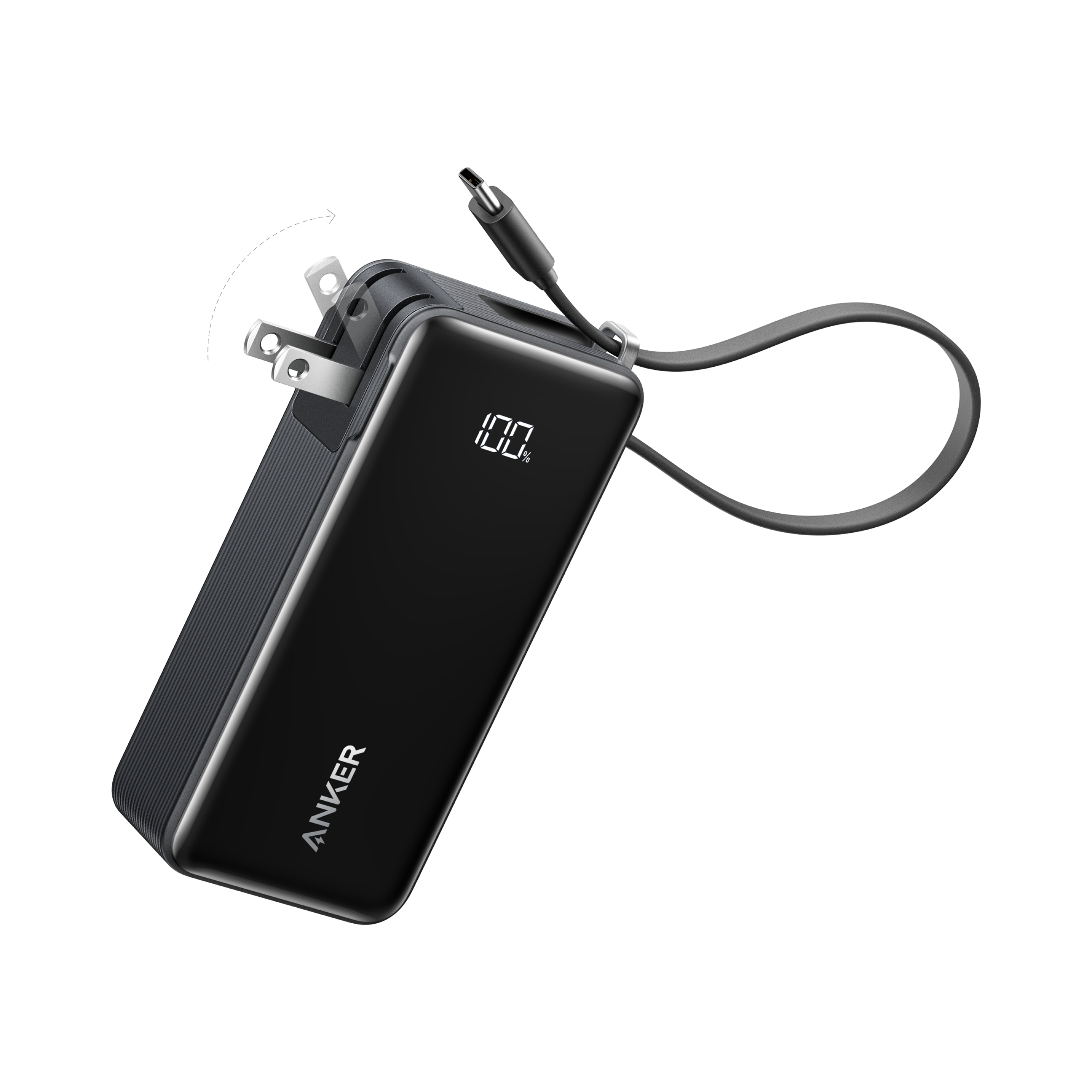 A black Anker Power Bank (10K, Fusion, Built-In Cable) with a digital display reading "100%" and a foldable wall plug. Its charging cable extends outward, all set against a plain white background.