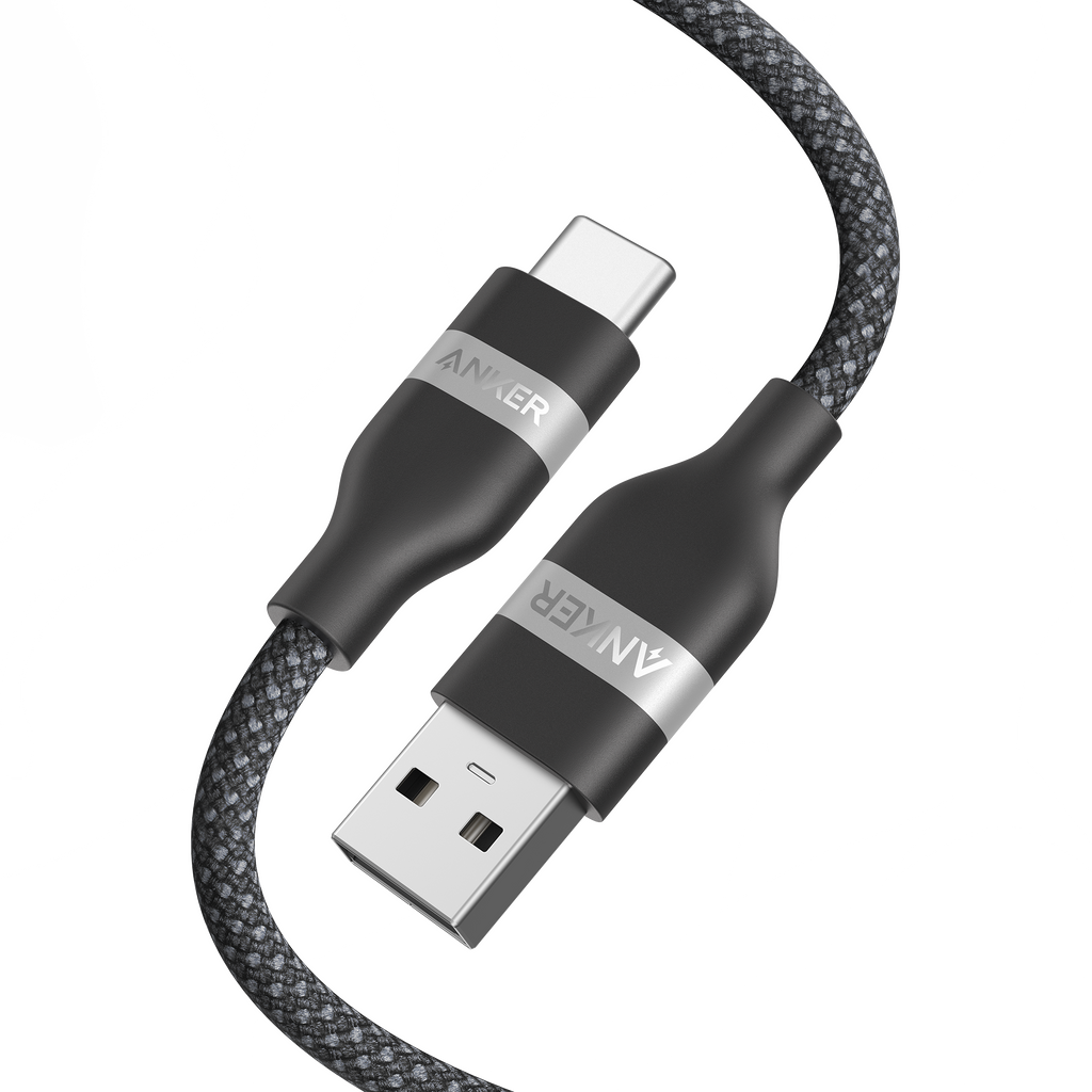 A close-up of the Anker USB-A to USB-C Cable (3 ft/6 ft, Upcycled-Braided), featuring a durable black and gray upcycled-braided design with "ANKER"-labeled metallic connectors made from recycled materials.