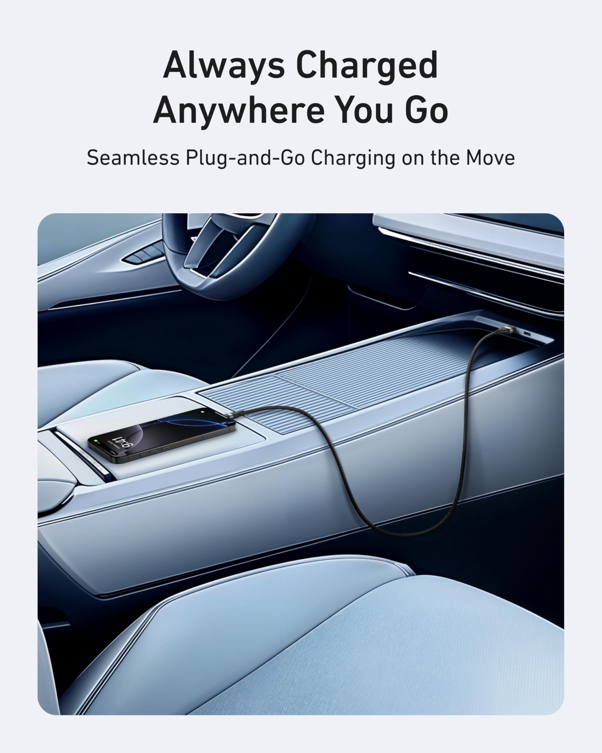A smartphone charges on a car’s console with an Anker USB-A to USB-C Cable (3 ft, Upcycled-Braided) plugged in. Modern interior with light blue seats; text above: "Always Charged Anywhere You Go. Seamless Plug-and-Go Charging on the Move.