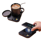 Two views of the black Sip & Charge 2-in-1 Wireless Charger & Mug Warmer with a latte and a lid. The device features a lightning bolt symbol, warming a mug in one view and wirelessly charging a smartphone in the other.