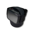 A black smartwatch with a square face and black strap is wrapped around a Charging Stand, set against a plain white background.