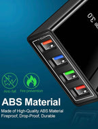A close-up of the USB Wall Charger Plug Block Cube 4 Port Portable Quick Charger in black, featuring four colored USB ports. Highlights: anti-fall, fireproof, durable ABS material—safe and portable for quick charging.