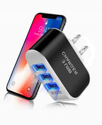 The USB Wall Charger Plug Block Cube 3 Port Portable Fast Charger, shown in black and silver with three blue ports, features foldable prongs, "CHARGER" printed on the side, and is displayed in front of a phone showing 9:41.