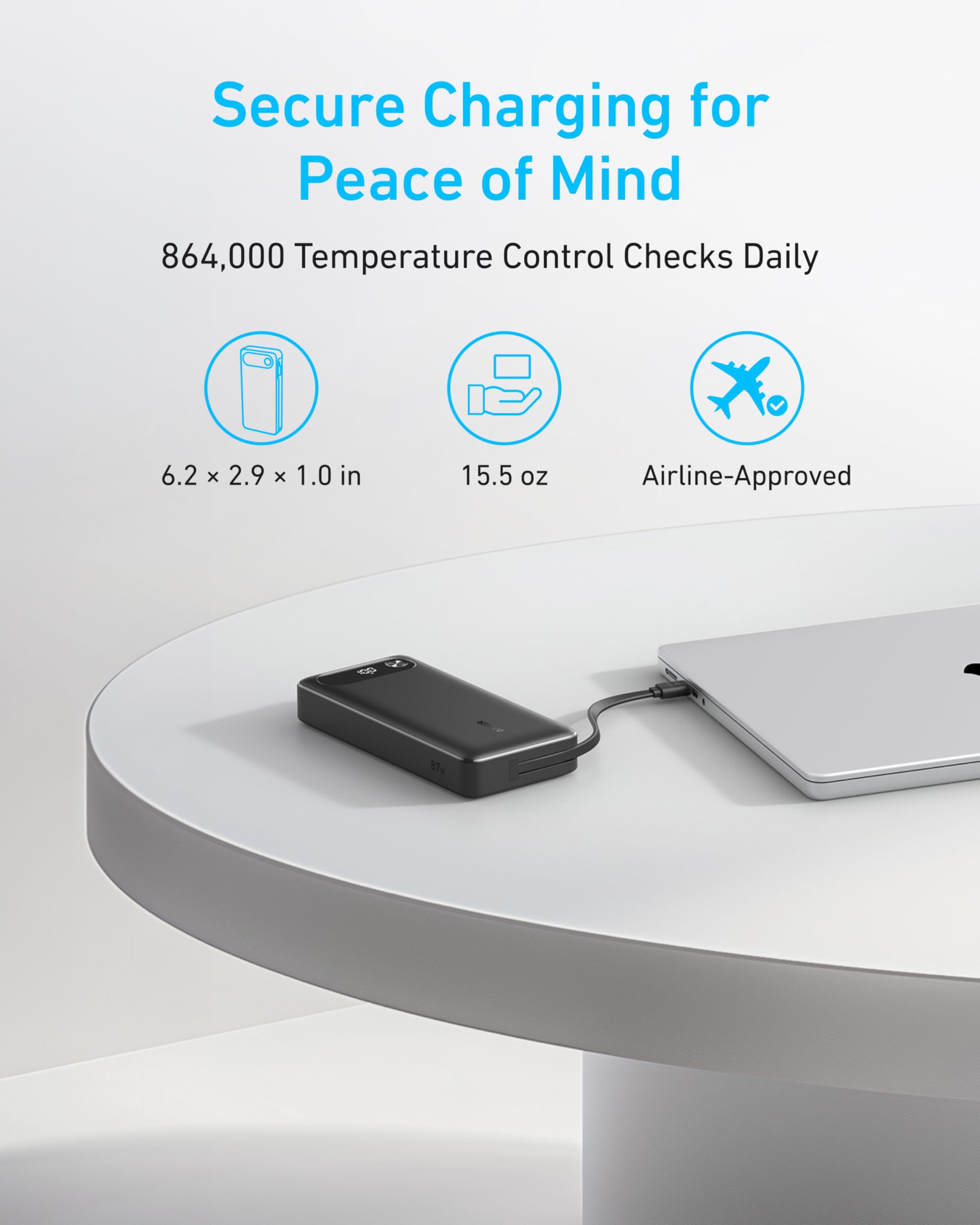 The Anker Power Bank (20K, 87W, Built-In USB-C Cable) charges a laptop on a white round table. Enjoy secure charging with daily temperature checks, compact and lightweight design, airline approval, and fast USB-C charging capability.