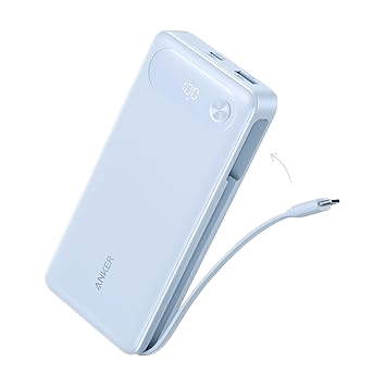 A white Anker Power Bank (20K, 87W, Built-In USB-C Cable) with a partially extended integrated USB-C cable and two visible USB ports on the top edge, delivering 65W fast charging and featuring a high-capacity 20,000mAh battery for your devices.