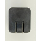 A black 65W GaN USB-C Wall Charger with a built-in cable and foldable plug is shown against a plain light background, featuring two metal prongs facing forward.