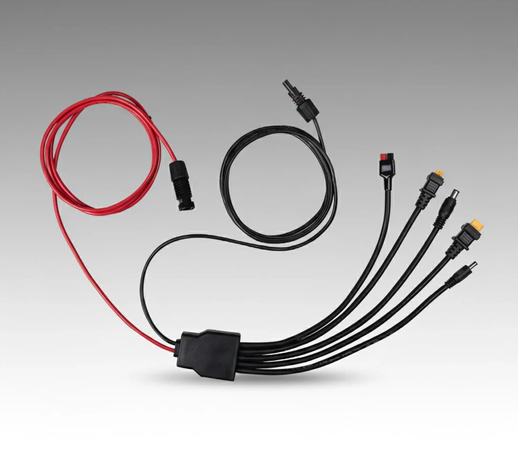 The Renogy 8FT Solar Charging Adapter Cable with Multi DC Connectors includes a red and black power wire plus four black cables, perfect for off-grid solar charging or portable power stations. Shown on a gray gradient background.